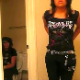 One girl brushes her hair as her friend poops while sitting on a toilet in the background. The girl on the toilet wipes her ass and shows us her dirty toilet paper. Audible plop sound is heard.